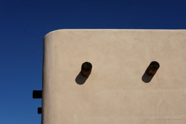 Shadows on an adobe building 