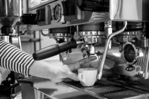Pouring a espresso shot at Harbinger Coffee
